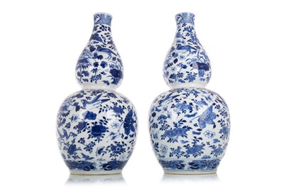 Lot 1050 - PAIR OF CHINESE BLUE AND WHITE DOUBLE GOURD VASES