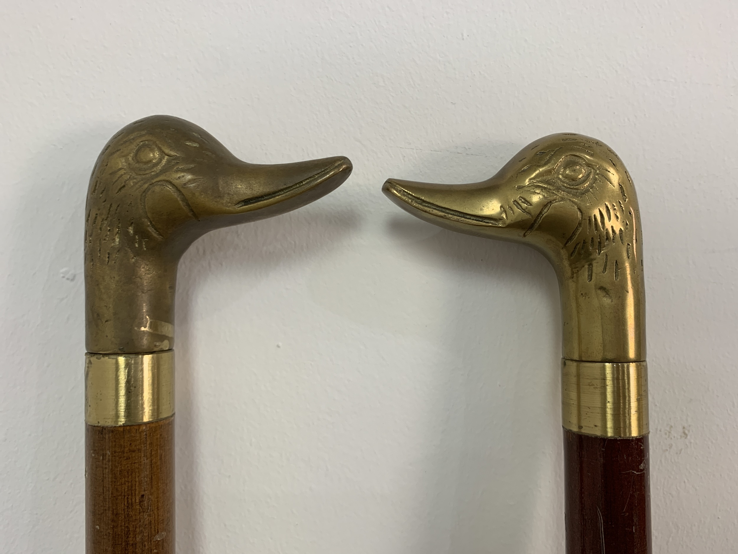 Lot 523 - TWO BRASS TOPPER STICKS