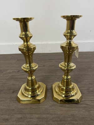 Lot 617 - SIX BRASS CANDLESTICKS