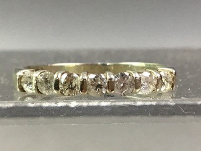 Lot 16 - SEVEN STONE DIAMOND RING