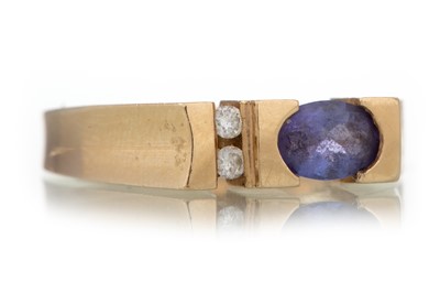 Lot 1220 - TANZANITE AND DIAMOND RING