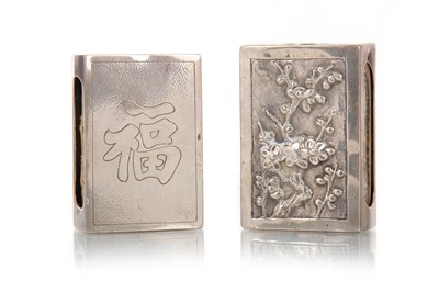 Lot 1064 - TWO CHINESE SILVER MATCHBOX HOLDERS