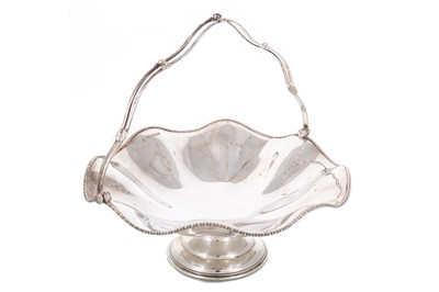 Lot 118 - EDWARDIAN SILVER CAKE/FRUIT BASKET
