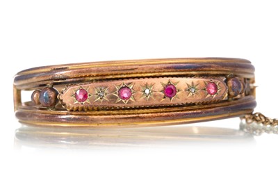 Lot 1238 - RUBY AND DIAMOND BANGLE