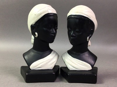Lot 588 - PAIR OF PAINTED PLASTER BOOKENDS