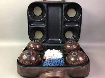 Lot 572 - CASED SET OF FOUR THOMAS TAYLOR LTD LAWN BOWLS
