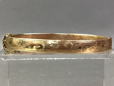 Lot 172 - ROLLED GOLD BANGLE