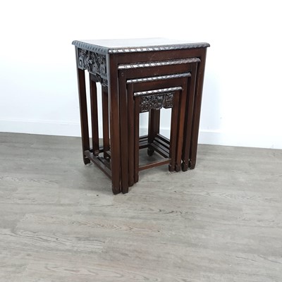 Lot 229 - STAINED OAK NEST OF FOUR TABLES