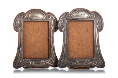 Lot 729 - PAIR OF EDWARDIAN SILVER ART NOUVEAU PHOTOGRAPH FRAMES