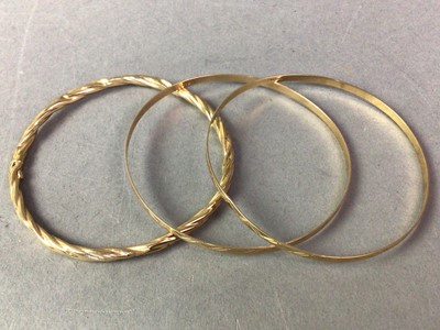 Lot 382 - THREE NINE CARAT GOLD BANGLES