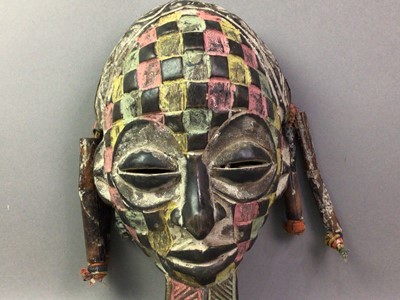 Lot 165 - THREE CHOKWE RASTA MASKS