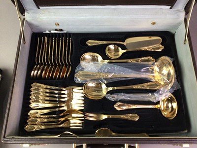 Lot 437 - SBS BESTECKE SOLINGEN, TWELVE SETTING SERVICE OF GOLD PLATED CUTLERY