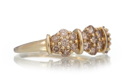 Lot 539 - CHAMPAGNE DIAMOND DAISY CLUSTER RING