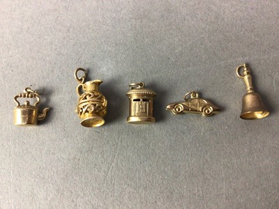 Lot 193 - FIVE NINE CARAT GOLD CHARMS