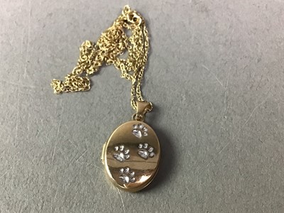 Lot 505 - NINE CARAT GOLD LOCKET