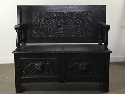 Lot 549 - CARVED OAK MONKS BENCH