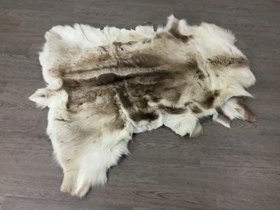 Lot 553 - REINDEER HIDE RUG/THROW