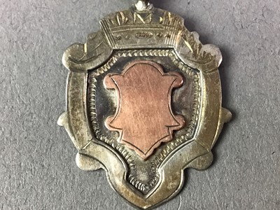 Lot 575 - FOUR SILVER MEDAL FOBS