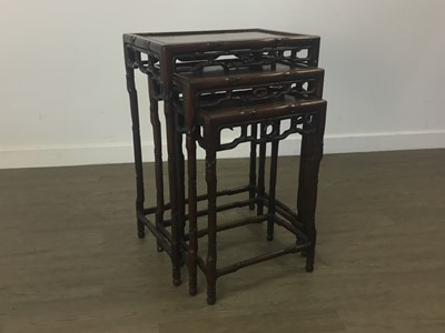 Lot 1090 - CHINESE HARDWOOD NEST OF THREE TABLES