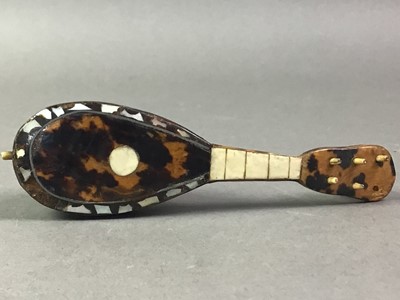 Lot 140 - TWO MINATURE TORTOISESHELL STRING INSTRUMENTS