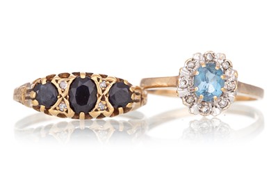 Lot 687 - TOPAZ AND DIAMOND CLUSTER RING