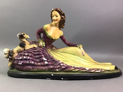 Lot 591 - ART DECO PAINTED PLASTER FIGURE OF A LADY AND DOG