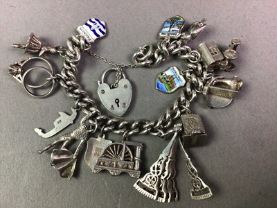 Lot 583 - SILVER CHARM BRACELET