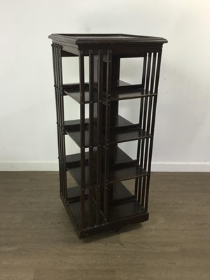 Lot 556 - OAK REVOLVING BOOKCASE