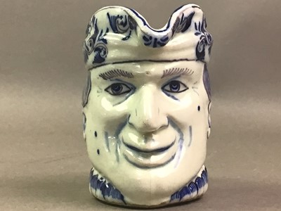 Lot 633 - FRENCH BLUE AND WHITE TOBY JUG