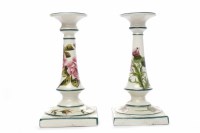 Lot 425 - TWO WEMYSS CANDLESTICKS hand-painted with rose...