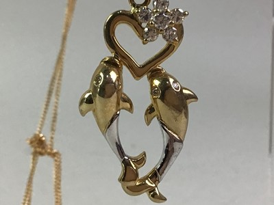 Lot 339 - GEM SET DOLPHIN PENDANT