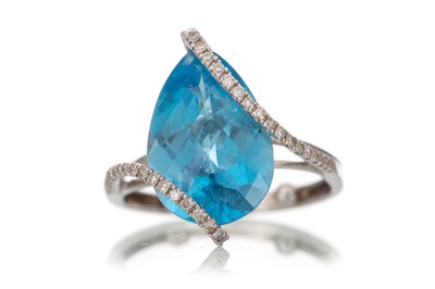 Lot 426 - BLUE TOPAZ AND DIAMOND RING