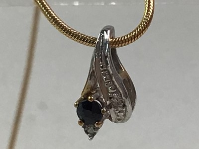 Lot 469 - SAPPHIRE AND DIAMOND PENDANT ON CHAIN