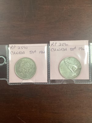 Lot 85 - TWENTY TWO CANADIAN SILVER CENTS AND DOLLARS