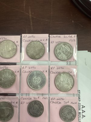 Lot 85 - TWENTY TWO CANADIAN SILVER CENTS AND DOLLARS