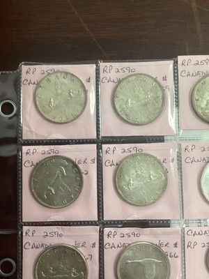 Lot 85 - TWENTY TWO CANADIAN SILVER CENTS AND DOLLARS