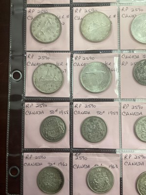 Lot 85 - TWENTY TWO CANADIAN SILVER CENTS AND DOLLARS