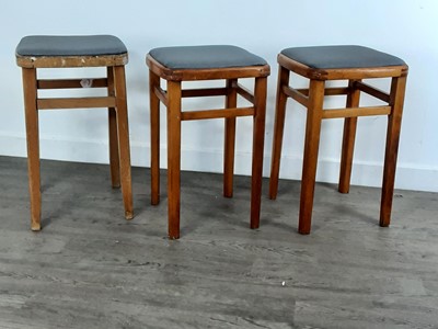 Lot 655 - THREE MID CENTURY BEECH BAR STOOLS