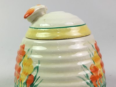 Lot 689 - TWO CLARICE CLIFF PRESERVE POTS WITH COVERS