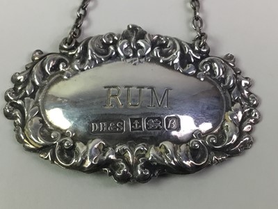 Lot 702 - SILVER RUM DECANTER LABEL AND SILVER COFFEE SPOONS