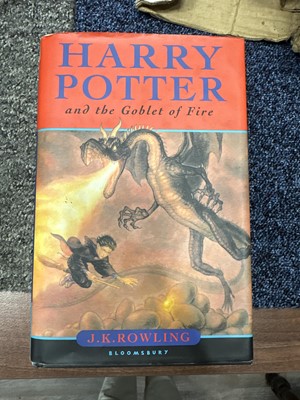 Lot 921 - ROWLING (J .K.), THREE HARRY POTTER VOLUMES, SIGNED WITH PERSONALISED INSCRIPTIONS