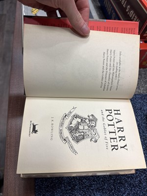 Lot 921 - ROWLING (J .K.), THREE HARRY POTTER VOLUMES, SIGNED WITH PERSONALISED INSCRIPTIONS