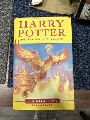 Lot 921 - ROWLING (J .K.), THREE HARRY POTTER VOLUMES, SIGNED WITH PERSONALISED INSCRIPTIONS