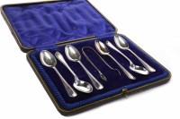 Lot 59 - SIX EDWARD VIII HAMMERED SILVER TEASPOONS AND...
