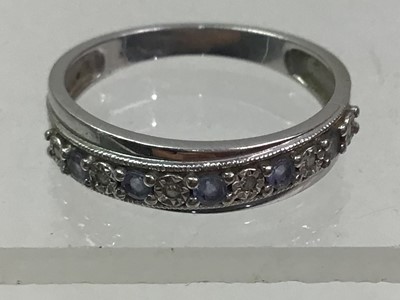 Lot 27 - TANZANITE AND DIAMOND RING