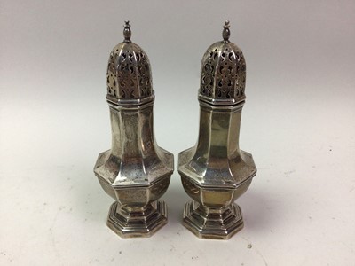 Lot 275 - PAIR OF GEORGE V SILVER PEPPER POTS