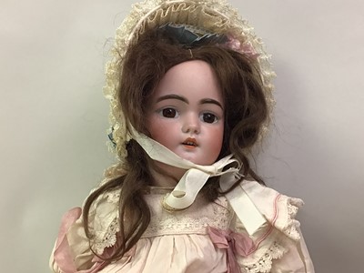 Lot 1023 - MANNER OF JUMEAU, TWO BISQUE HEAD SOCKET DOLLS