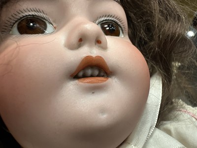 Lot 1023 - MANNER OF JUMEAU, TWO BISQUE HEAD SOCKET DOLLS