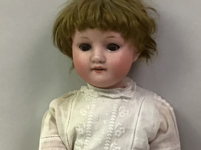 Lot 1027 - THREE GERMAN BISQUE HEAD SOCKET DOLLS