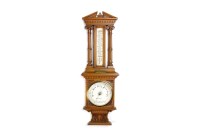 Lot 602 - LATE VICTORIAN CARVED OAK BAROMETER with...